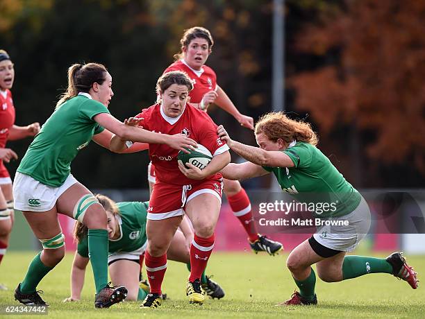 Leinster , Ireland - 19 November 2016; Carolyn McEwen of Canada is tackled by Nichola Fryday and Fiona Reidy of Ireland during the Women's Autumn...