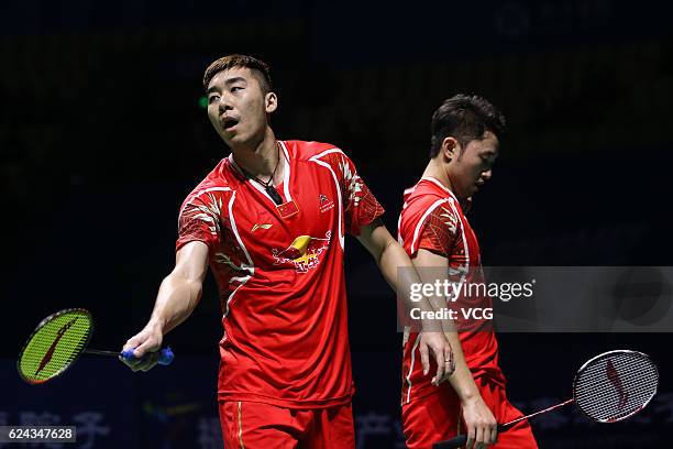 Chai Biao of China and Hong Wei of China compete against M Gideon of India and K Sukamuljo of India during men's doubles semifinal match on day five...