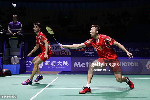 Chai Biao of China and Hong Wei of China compete against M Gideon of India and K Sukamuljo of India during men's doubles semifinal match on day five...