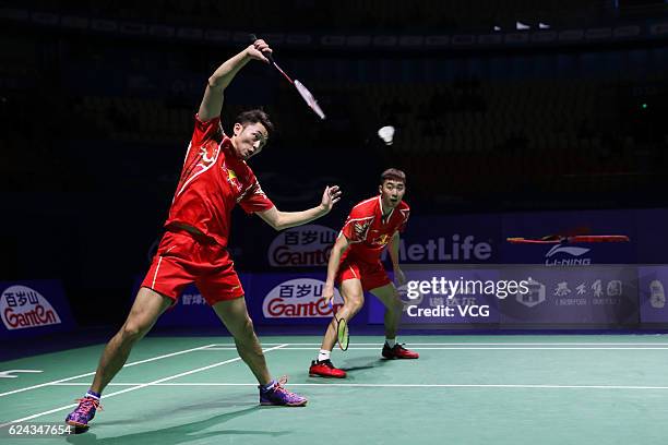 Chai Biao of China and Hong Wei of China compete against M Gideon of India and K Sukamuljo of India during men's doubles semifinal match on day five...