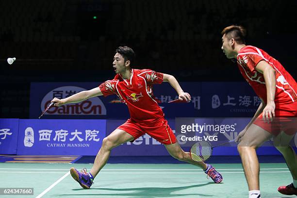 Chai Biao of China and Hong Wei of China compete against M Gideon of India and K Sukamuljo of India during men's doubles semifinal match on day five...