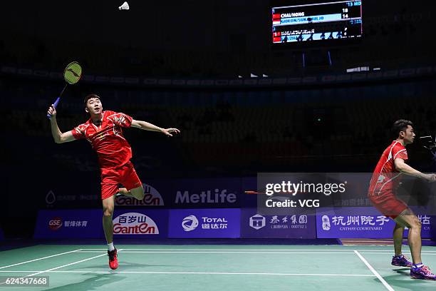 Chai Biao of China and Hong Wei of China compete against M Gideon of India and K Sukamuljo of India during men's doubles semifinal match on day five...