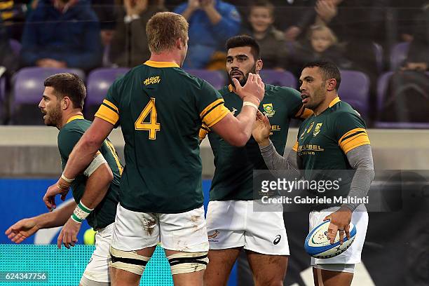 Bryan Habana of South Africa celebrates scoring a try with team mates during the international match between Italy v South Africa at Stadio Olimpico...