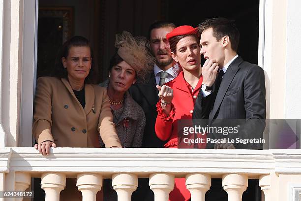 Princess Stephanie of Monaco, Princess Caroline of Hanover, Pierre Casiraghi, Charlotte Casiraghi and Louis Ducruet greet the crowd from the palace's...