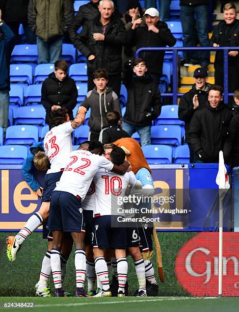 Bolton Wanderers' Josh Vela celebrates scoring the opening goal with team-mates during the Sky Bet League One match between Bolton Wanderers and...