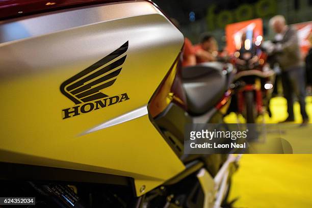 The Honda logo is seen on a motorbike at the "Motorcycle Live" show on November 19, 2016 in Birmingham, England. The show features the latest bikes,...
