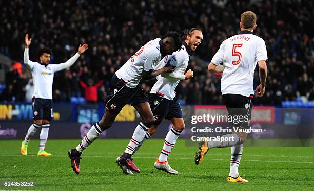 Bolton Wanderers' Tom Thorpe, centre, celebrates scoring his sides second goal with team-mates Sammy Ameobi, left, and Mark Beevers during the Sky...