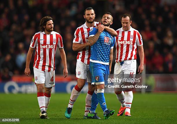 Erik Pieters of Stoke City and Jack Wilshere of AFC Bournemouth exchange words during the Premier League match between Stoke City and AFC Bournemouth...