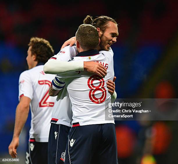 Bolton Wanderers' Tom Thorpe, left, celebrates scoring his sides second goal with team-mate Jay Spearing during the Sky Bet League One match between...