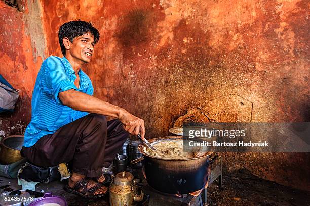 indian street seller selling tea - masala chai in jaipur - indian spice stock pictures, royalty-free photos & images