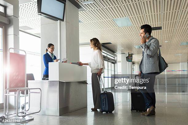 boarding the plane, departure lounge. - boarding stockfoto's en -beelden