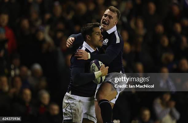 Sean Maitland of Scotland celebrates with Stuart Hogg of Scotland after he scores a try during the Scotland v Argentina Autumn Test Match at...