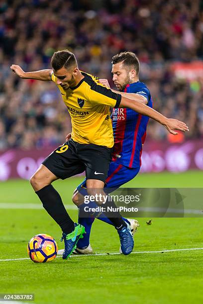 Jordi Alba and Javi Ontiveros during the match between FC Barcelona vs Malaga CF, for the round 12 of the Liga Santander, played at Camp Nou Stadium...