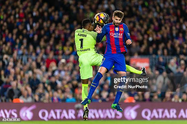 Pique and Carlos Kameni during the match between FC Barcelona vs Malaga CF, for the round 12 of the Liga Santander, played at Camp Nou Stadium on...