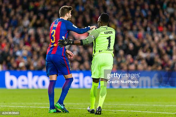 Pique and Carlos Kameni during the match between FC Barcelona vs Malaga CF, for the round 12 of the Liga Santander, played at Camp Nou Stadium on...