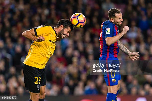 Miguel Torres and Paco Alcacer during the match between FC Barcelona vs Malaga CF, for the round 12 of the Liga Santander, played at Camp Nou Stadium...
