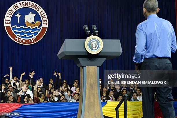 President Barack Obama takes questions during a Young Leaders of the Americas Initiative town hall meeting at the Pontifical Catholic University of...