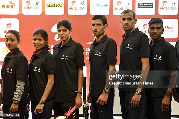 Elite Indian women marathoners Monica Atre, Sanjivani Jadhav, and Sudha Singh along with elite men marathoners Maan Singh, Mohd. Yunus and G. Laxman...