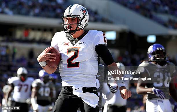 Mason Rudolph of the Oklahoma State Cowboys celebrates after scoring a touchdown against the TCU Horned Frogs in the second half at Amon G. Carter...