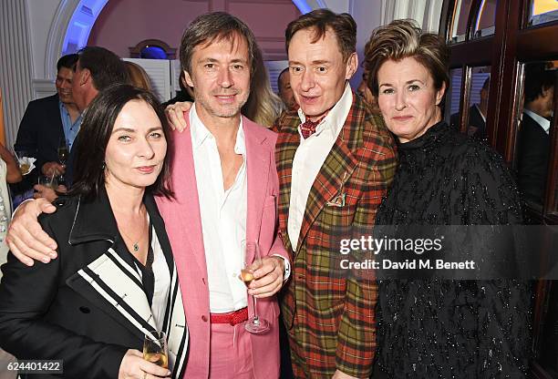 Gillian McVey, Marc Newson, Nick Foulkes and Alex Foulkes attend Claridge's Christmas Tree 2016 Party, with tree designed by Sir Jony Ive and Marc...