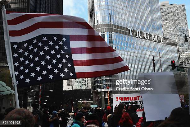 Demonstrators rally near Trump Tower after marching through downtown protesting President-Elect Donald Trump on November 19, 2016 in Chicago,...