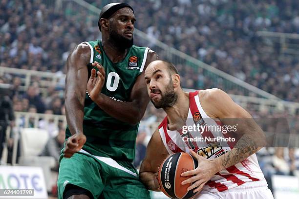 Chris Singleton of Panathinaikos tries to block Vassilis Spanoulis of Olympiacos during the Euroleague round 8, game between Panathinaikos Superfoods...