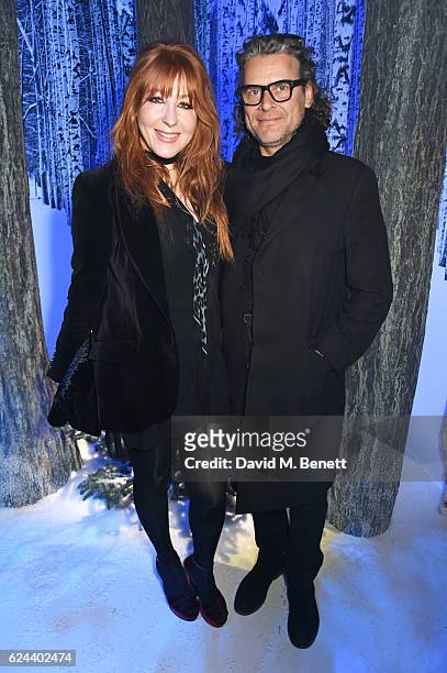 Charlotte Tilbury and George Waud attend Claridge's Christmas Tree 2016 Party, with tree designed by Sir Jony Ive and Marc Newson, at Claridge's...