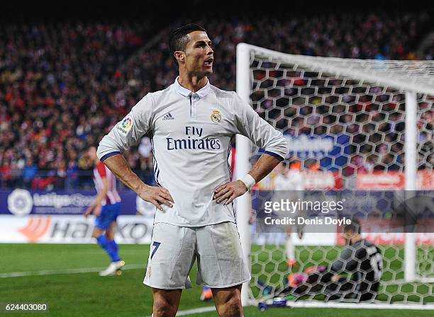 Cristiano Ronaldo of Real Madrid celebrate after scoring Real's 3rd goal during the La Liga match between Club Atletico de Madrid and Real Madrid CF...