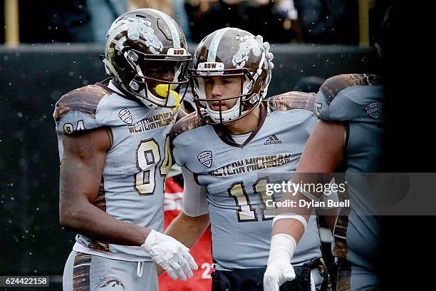 Corey Davis and Zach Terrell of the Western Michigan Broncos celebrate after scoring a touchdown in the second quarter against the Buffalo Bulls at...