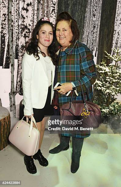 Suzy Menkes and guest attend Claridge's Christmas Tree 2016 Party, with tree designed by Sir Jony Ive and Marc Newson, at Claridge's Hotel on...