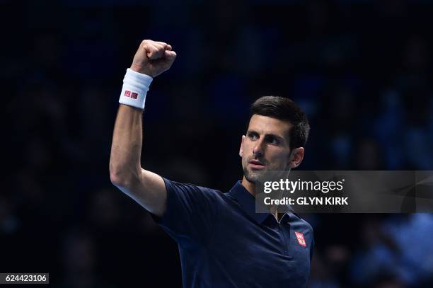 Serbia's Novak Djokovic celebrates beating Japan's Kei Nishikori during their men's semi-final singles match on day seven of the ATP World Tour...