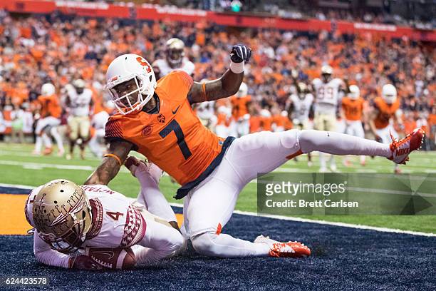 Tarvarus McFadden of the Florida State Seminoles makes an interception on a pass intended for Amba Etta-Tawo of the Syracuse Orange during the second...