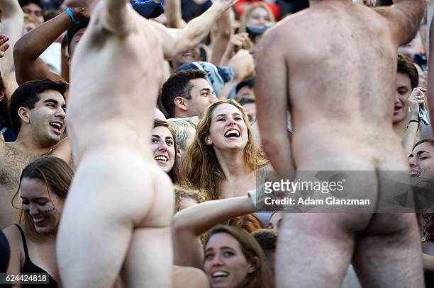 Naked fans cheer during the game between the Yale Bulldogs and the Harvard Crimson at Harvard Stadium on November 19, 2016 in Boston, Massachusetts.