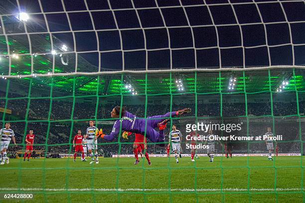Goal Keeper Yann Sommer of Borussia Moenchengladbach can only watch the ball from Midfielder Marcel Risse of 1.FC Koeln into the net during the 1....