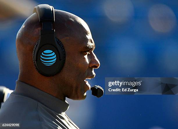 Charlie Strong head coach of the Texas Longhorns watches his team during a game Kansas Jayhawks in the first quarter at Memorial Stadium on November...