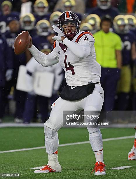 Jerod Evans of the Virginia Tech Hokies passes against the Notre Dame Fighting Irish at Notre Dame Stadium on November 19, 2016 in South Bend,...