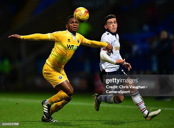 Bolton Wanderers' Zach Clough vies for possession with Millwall's Mahlon Romeo during the Sky Bet League One match between Bolton Wanderers and...