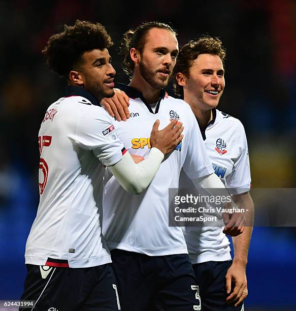 Bolton Wanderers' Tom Thorpe, centre, celebrates scoring his sides second goal with team-mates Derik Osede, left, and Lawrie Wilson during the Sky...