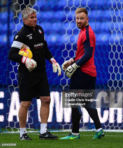 Bolton Wanderers's goalkeeping coach Lee Butler, left, and Bolton Wanderers' Ben Alnwick during the pre-match warm-up before the Sky Bet League One...