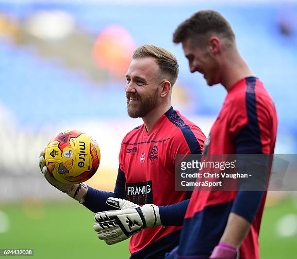 Bolton Wanderers' Ben Alnwick, left, and Bolton Wanderers' Jake Turner during the pre-match warm-up before the Sky Bet League One match between...