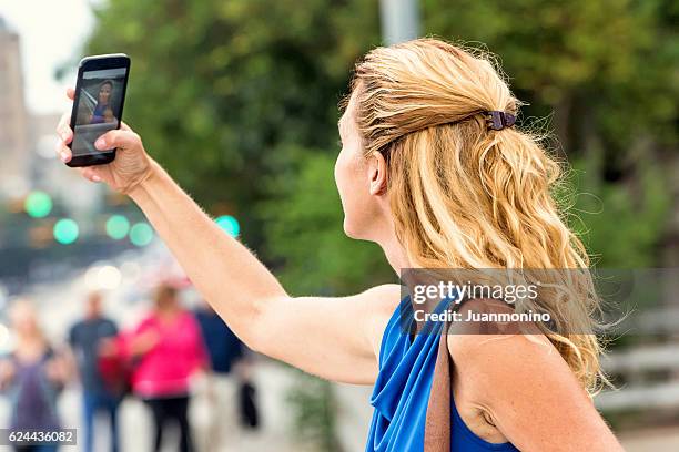 selfie  - blonde woman selfie foto e immagini stock