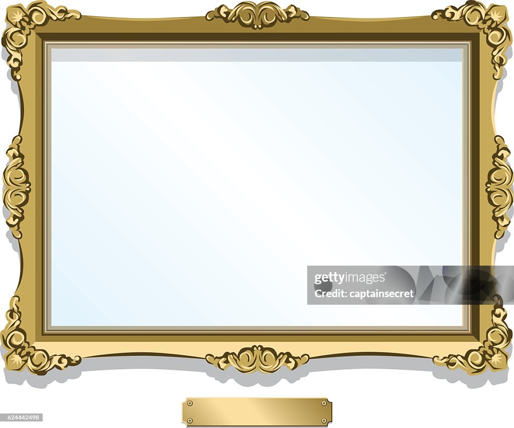 Gold gilded frame with plaque isolated on white