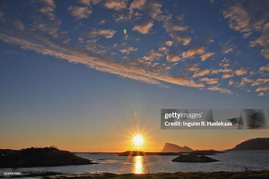 Midnight sun seen from Sommarøy in county Troms. Summer in Northern Norway
