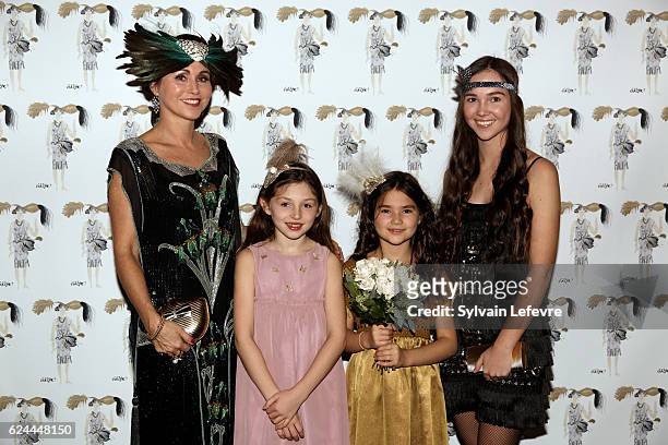 Florence Reckinger-Taddeï and family pose for photocall as they arrive for the 20th Luxembourg Red Cross Ball Gala on November 19, 2016 in...