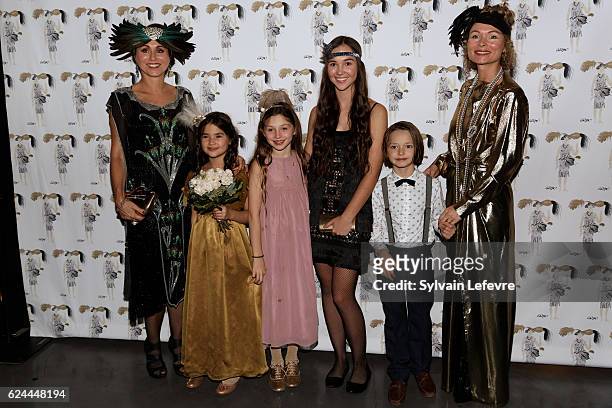 Florence Reckinger-Taddeï and family pose for photocall as they arrive for the 20th Luxembourg Red Cross Ball Gala on November 19, 2016 in...