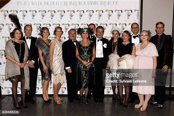 Florence Reckinger-Taddei poses for photocall with Red Cross members as she arrives for the 20th Luxembourg Red Cross Ball Gala on November 19, 2016...