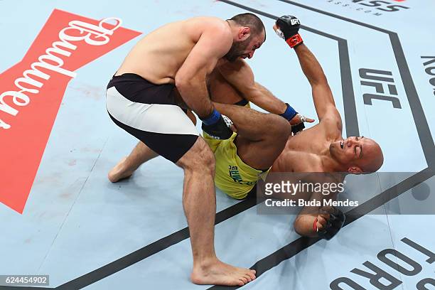 Gadzhimurad Antigulov of Russia punches Marcos Rogerio de Lima of Brazil during their light heavyweight bout at the UFC Fight Night Bader v Minotouro...