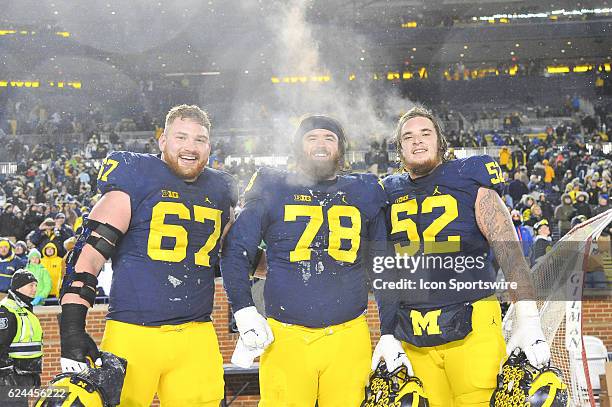 Michigan Wolverines offensive lineman Kyle Kalis Michigan Wolverines offensive lineman Erik Magnuson and Michigan Wolverines offensive lineman Mason...