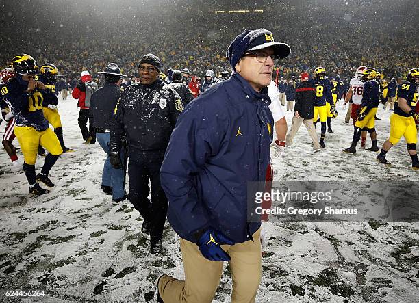 Head coach Jim Harbaugh leaves the field after playing the Indiana Hoosiers on November 19, 2016 at Michigan Stadium in Ann Arbor, Michigan. Michigan...