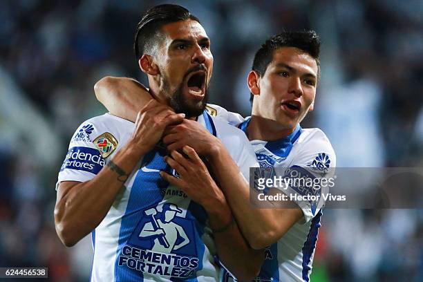 Franco Jara of Pachuca celebrates with teammate Hirving Lozano after scoring the second goal of his team during the 17th round match between Pachuca...